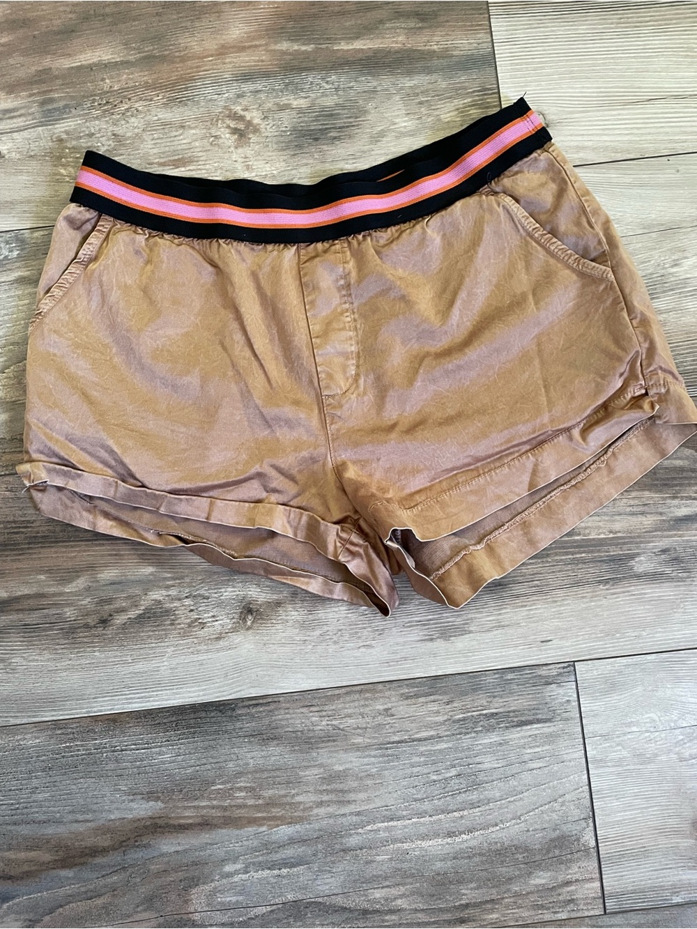FP Movement by Free People gold shiny shorts with elastic waistband